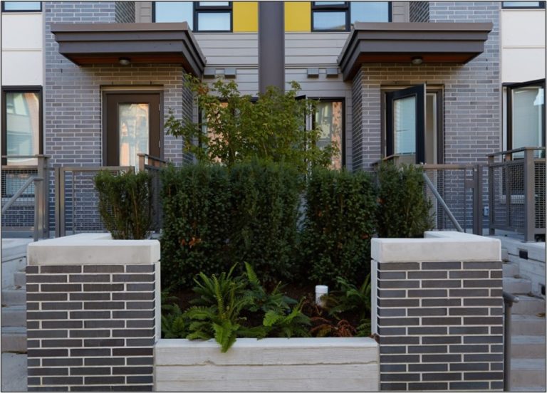 These 12” long ironspot brick are laid in 1/3 bond to provide a horizontal aspect.